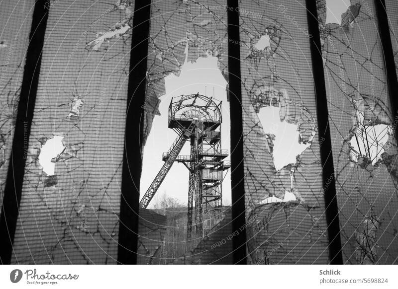 Simon Forbach mine winding tower View through destroyed window with wired glass Mining Pit Mine tower Window Wire glass Black & white photo Pit Simon Puit Simon