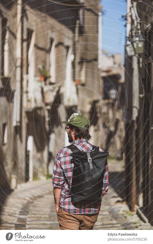 Rear view of a man exploring Italian city Erice walking outdoors people active one person travel Sicily Italy Looking At View adventure exploration adult