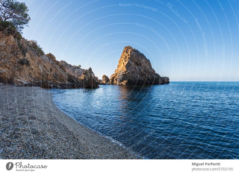 Cañuelo Beach, a cove in the Maro-Cerro Gordo Cliffs natural area, in the municipality of Nerja, Malaga. cañuelo beach nerja malaga mediterranean