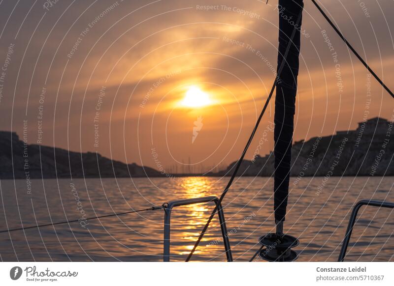 Evening atmosphere over Frioul from a sailing boat. Sky Nature Light Sunset evening mood Sailboat Sailing Moody Twilight Water Mediterranean sea coast Islands