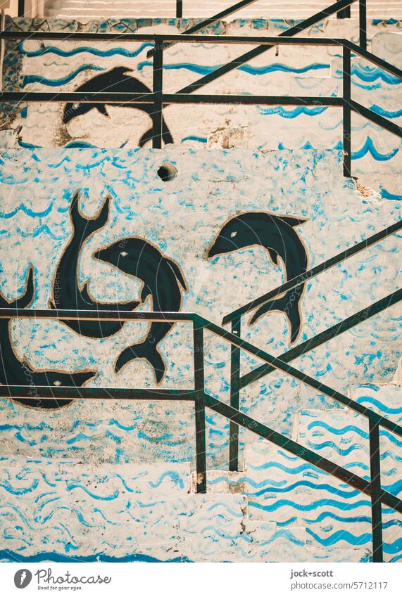 Dolphins on the stairs Banister Painted Street art Structures and shapes Creativity Water wave Waves Greek Wall (building) Contrast contour Mural painting