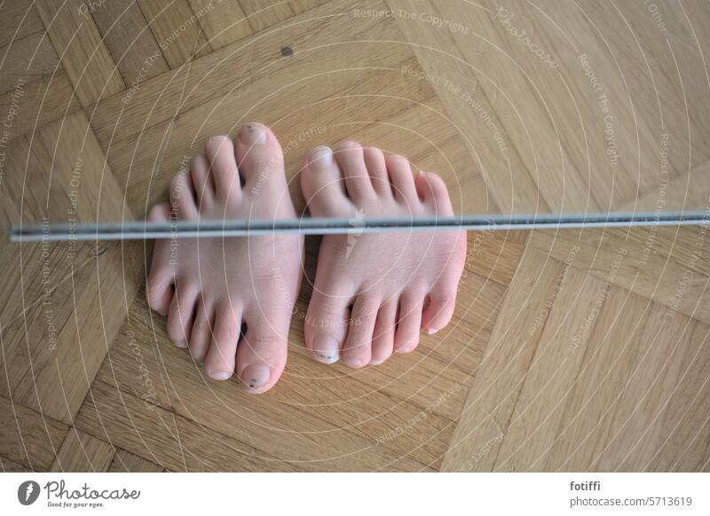 Children's feet are reflected in the mirror like aliens Mirror Reflection reflection Mirror image Human being Grotesque queer Funny Interior shot Wooden floor