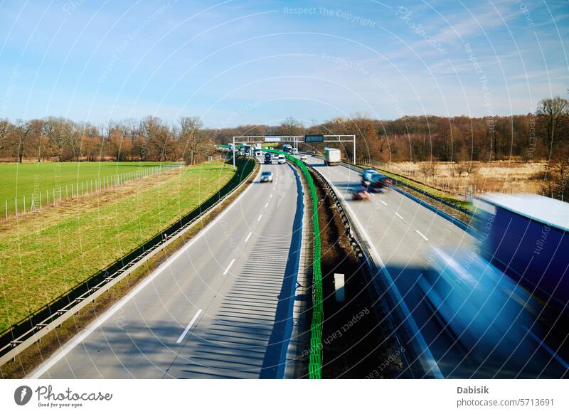 Traffic on motorway with motion blurred cars highway traffic busy rush hour long exposure road speed driving daylight transport asphalt movement travel outdoors