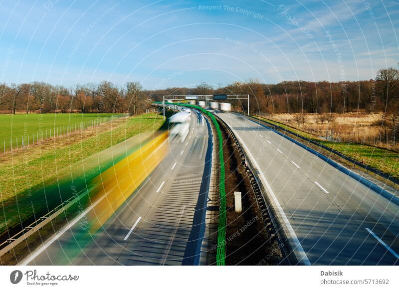 Traffic on motorway with motion blurred cars highway traffic busy rush hour long exposure road speed driving daylight transport asphalt movement travel outdoors