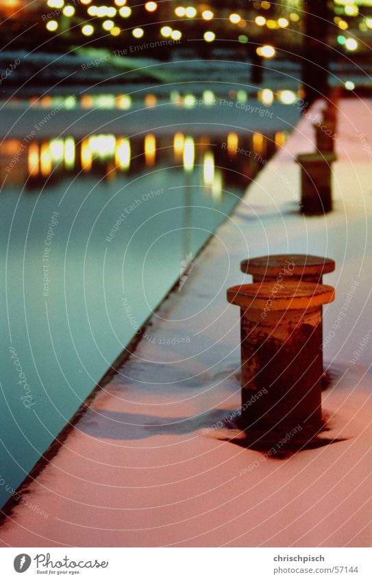 Play of colours at the ferry dock Long exposure Current Ice floe Winter Morning Twilight Bollard Jetty Reflection Elbe Hamburg Harbour Dawn