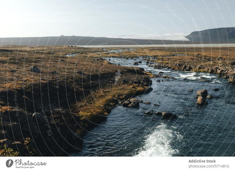 Tranquil river landscape in rural Iceland iceland tranquil serene clear sky mountain flow water nature natural outdoors scenic beauty wilderness travel