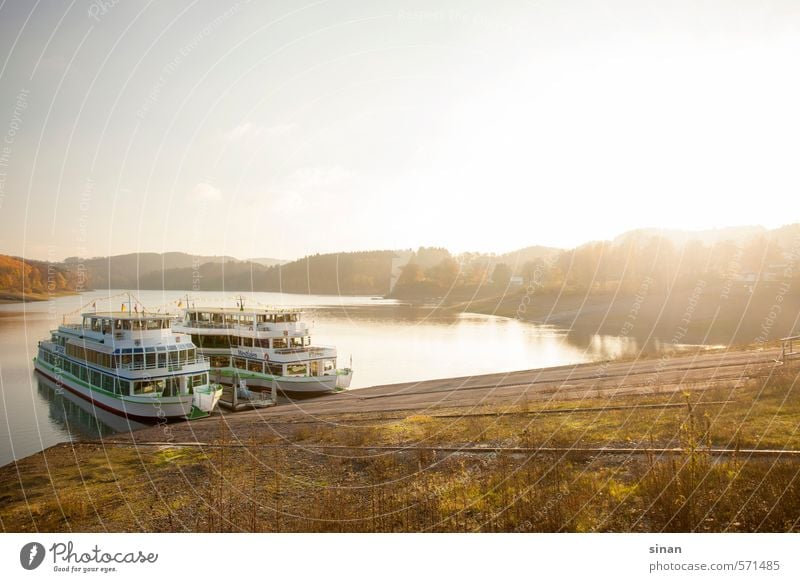 Ships on Lake Bigge Vacation & Travel Sun Mountain Nature Landscape Water Horizon Autumn Weather Tree Forest Inland navigation Watercraft Cold Blue Brown Green