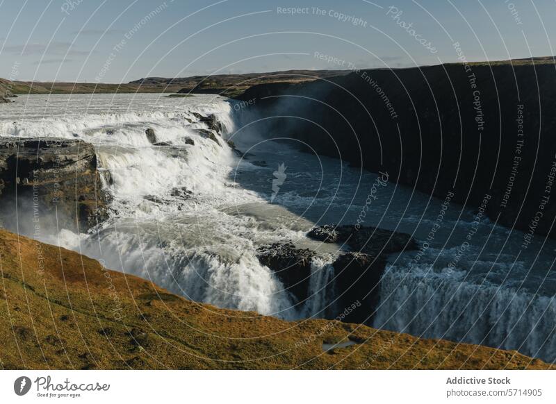 Generated image iceland gullfoss waterfall cascade golden circle landscape nature travel destination rugged canyon majestic dramatic scenic sightseeing