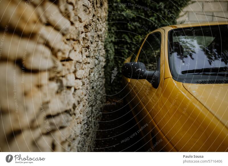 Yellow car parked Car automobile Colour Image Color Image Old Vehicle Exterior shot Automobiles Transport Parking lot Parked Street Motor vehicle Mobility