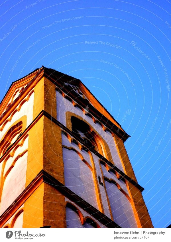 steeple Church spire Window Tower Religion and faith Sky Sun Blue sky Monastery