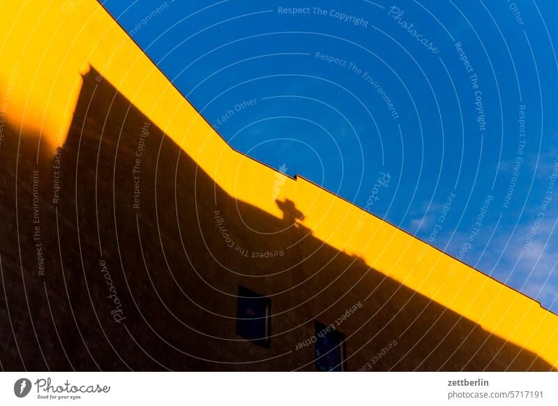 Last sun on the gable Architecture Berlin Office city Germany Twilight Facade Window Worm's-eye view Building Capital city House (Residential Structure) Sky