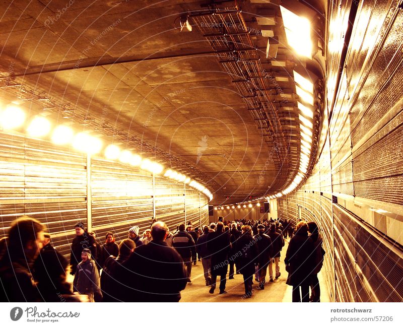 Crowd in the Tiergarten Tunnel Zoo tunnel Town Berlin zoo Underground Dark Concrete Steel Light Capital city Middle Human being Crowd of people Curve Arch