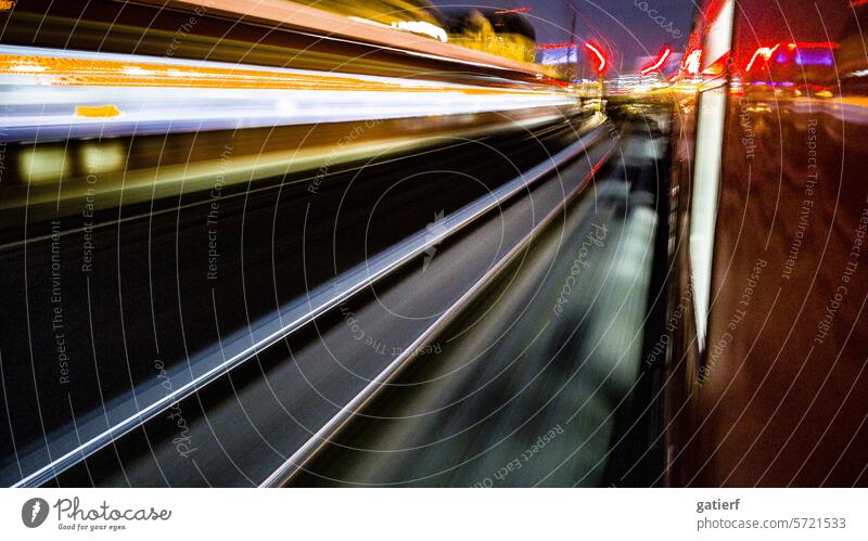 Traveling through the night - on the Regional Express to Frankfurt main station. It's late in the evening and the train meets an oncoming S-Bahn train