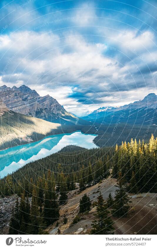 Mountains reflected in the turquoise lake (Peyto Lake) Canada Clouds Water Icefield parkway Rocky Mountains Vacation & Travel Exterior shot Colour photo Tourism