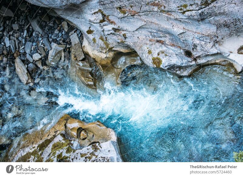 Gorge from above Water eats through rock Canyon Brook Blue stones Rock Landscape Flow running water flowing water Nature River Day Exterior shot Outdoors