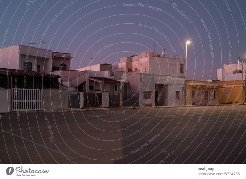 Deserted southern Italian village square in the dusky evening light - off-season Village Building Places Empty shabby silent Holiday Village Evening Off-Season