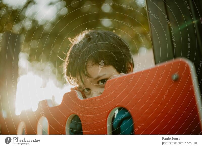 Cute Boy peeking Boy (child) Child Infancy Joy Caucasian Small Playing young Colour photo Day Portrait photograph kid people Happy Delightful Happiness