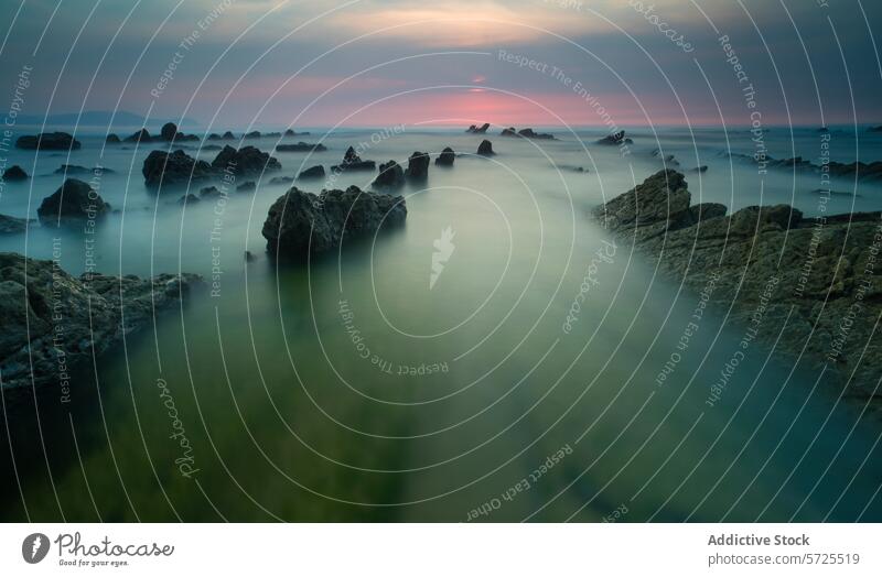 Mystical sunset at Barrika Beach, Biscay, Spain barrika beach biscay spain long-exposure rocks serene ethereal seascape landscape dreamlike atmosphere coastal