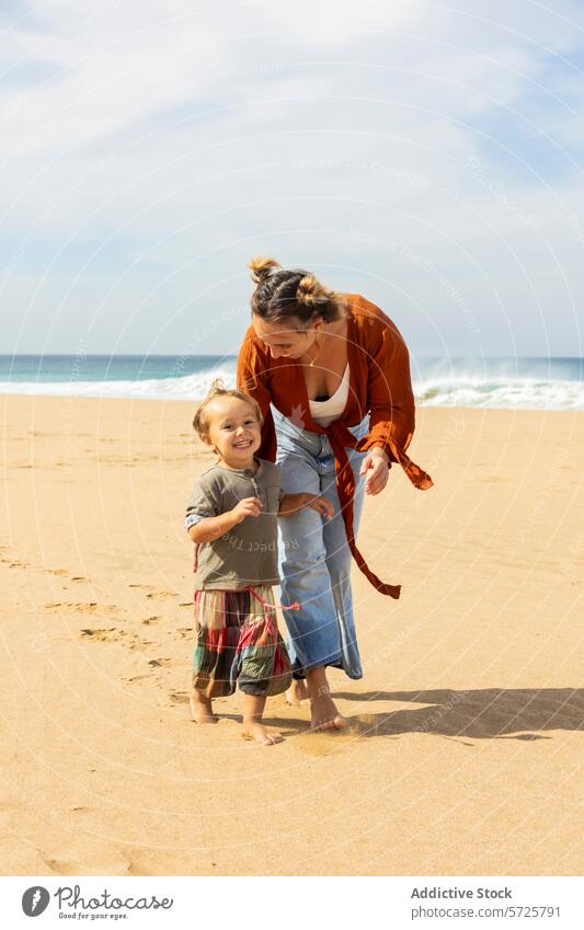 Joyful family moments on a sunny beach day fun mother child playful laugh walk sandy shoreline joy bonding carefree summer vacation holiday happiness ocean