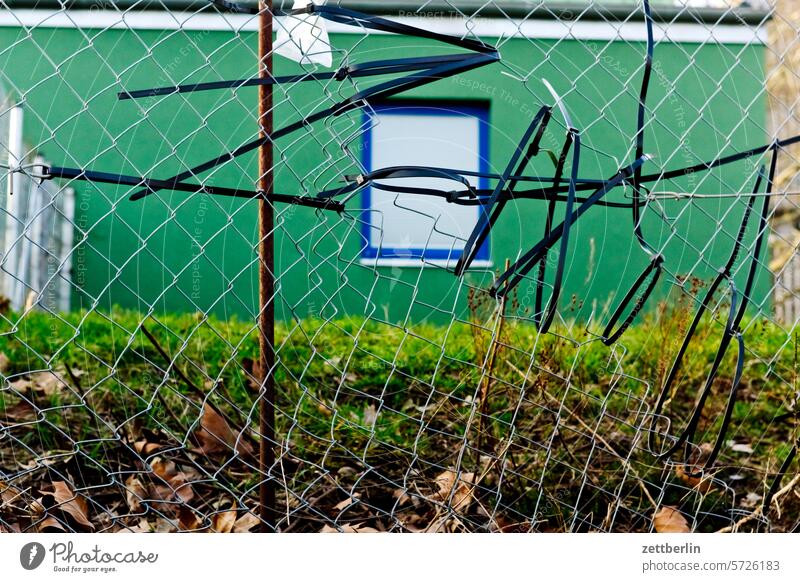 Mended wire mesh fence Architecture Berlin Office city Germany Facade Window Building Capital city House (Residential Structure) Sky High-rise downtown Kiez