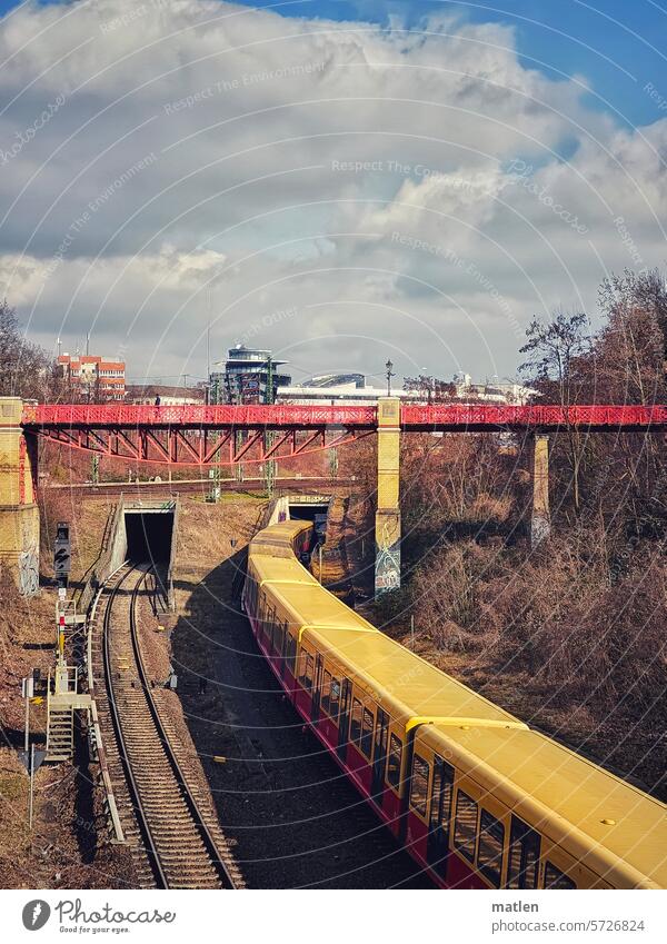 traffic routes Traffic infrastructure Commuter trains Curve Bridge Track system Berlin Sky Clouds Public transit Train travel Colour photo Right-hand bend