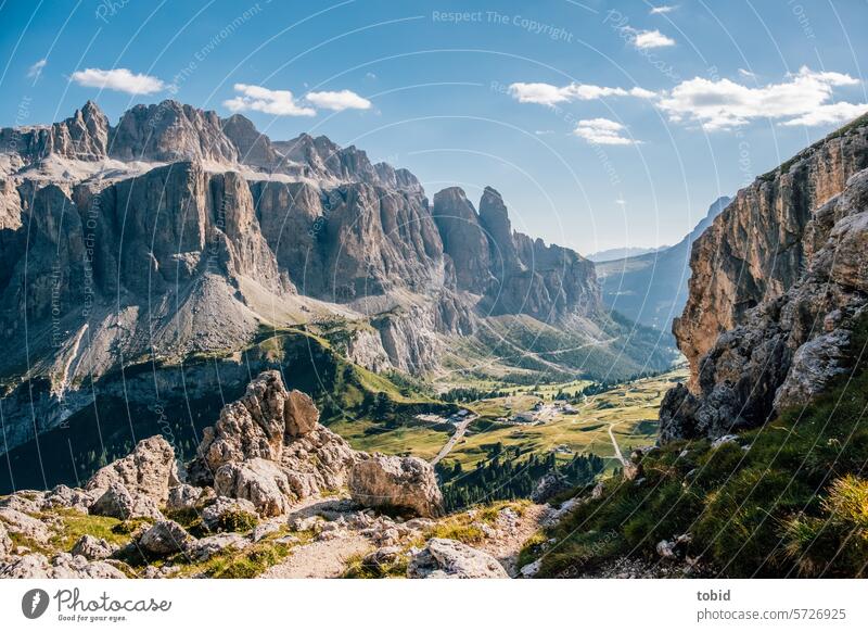 Gardena Pass Deserted Natural phenomenon Cloud formation alpine crossing Alps Flare Horizon plateau High plain Blue sky Clouds curt Light Storm clouds