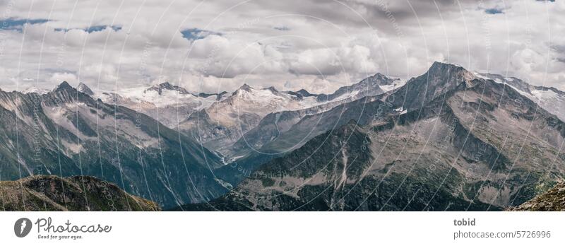 View over the Central Alps alpine crossing Rock Snowcapped peak Sky Clouds Beautiful weather Horizon Shadow impressive Nature Experiencing nature mountain flank