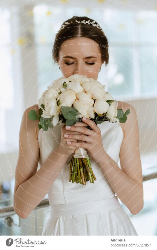 bride on the gold hotel stairs bouquet brown day dress first girl guy marry meeting newlyweds smile steps suit together towards two wedding white young