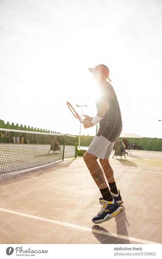 Tennis player in action during a sunny day tennis male sport outdoor court game ball racket sportsman athletic competition motion active lifestyle exercise