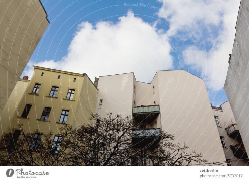 Backyard in Schöneberg Old building on the outside Fire wall Facade Window House (Residential Structure) Sky Sky blue rear building Courtyard Interior courtyard