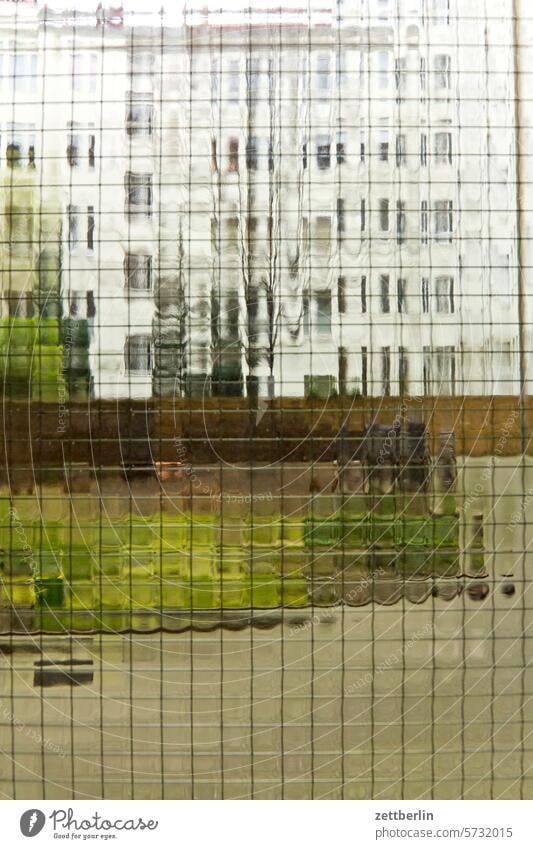 Backyard behind bulletproof glass Old building on the outside Fire wall Facade Window House (Residential Structure) Sky Sky blue rear building Courtyard