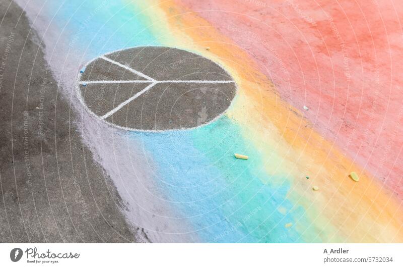 Peace Zeichen mit Regenbogenfarben auf Asphalt gemalt Attachment Friendship Prismatic colors Demonstration statement Peace Wish Peace Declaration Rainbow