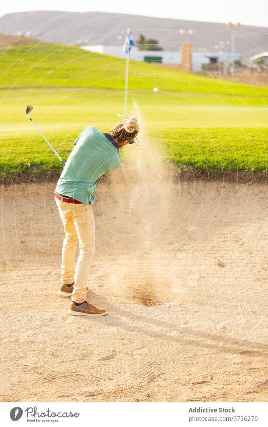 Unique Golfer with Dreadlocks Playing Sand Shot golfer dreadlocks sand bunker shot ball style swing golf course sand trap golf club golf ball dynamic unique