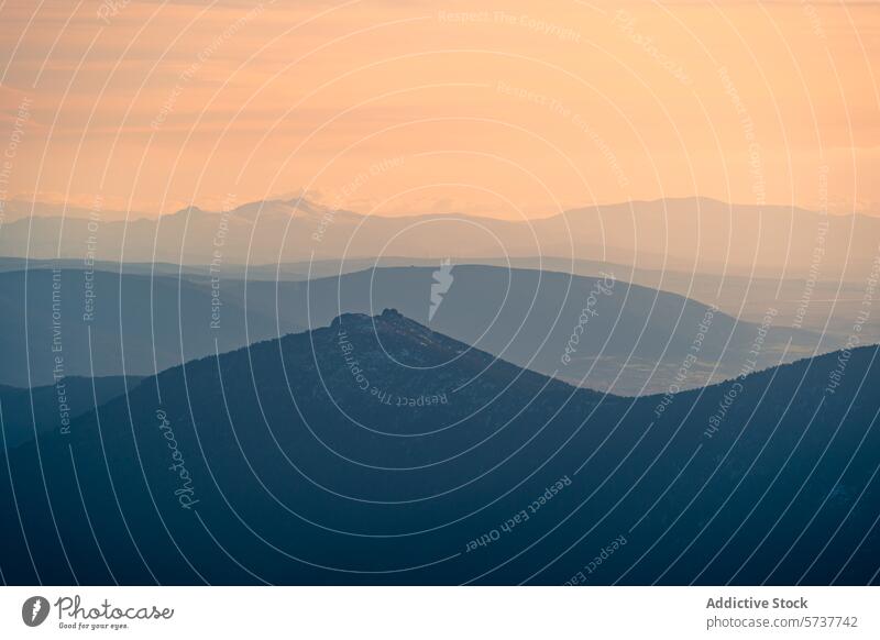 Serene sunset over Sierra de Guadarrama mountains sierra guadarrama madrid cerceda navacerrada landscape dusk serene soft hues nature scenic beauty tranquil