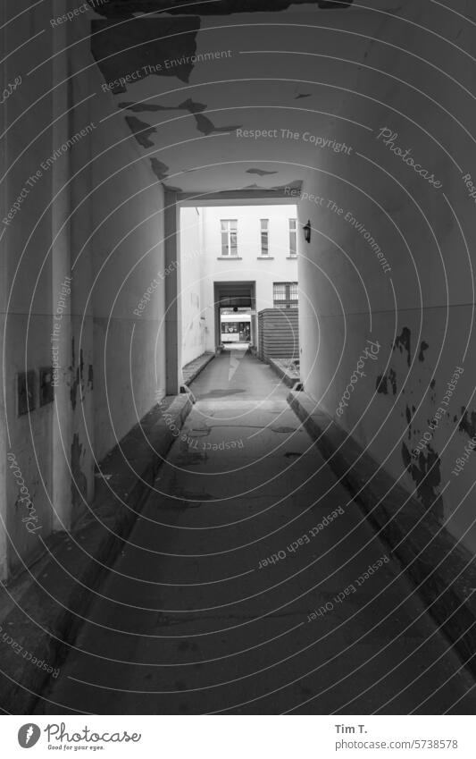 Passage to the backyard Prenzlauer Berg Berlin b/w Backyard passage Black & white photo Town Downtown Capital city Day Old town Deserted Exterior shot bnw