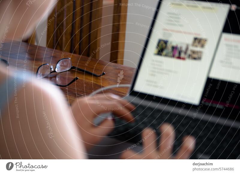 A girl sits in front of the PC and writes a text. write type Keyboard Letters (alphabet) Interior shot Close-up Fingers Hand Colour photo Write Typing