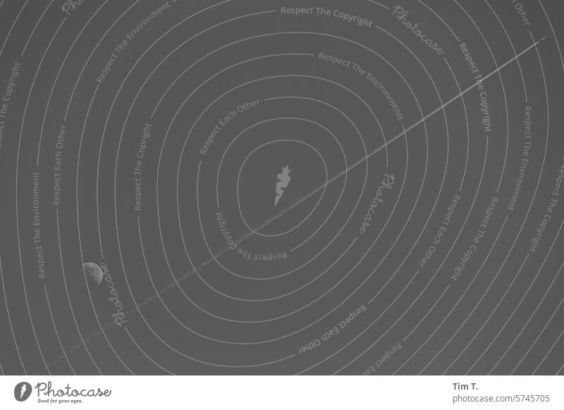 Moon with contrails and airplane Airplane condone strip b/w Black & white photo B/W B&W Day Exterior shot Deserted Calm Loneliness Sky