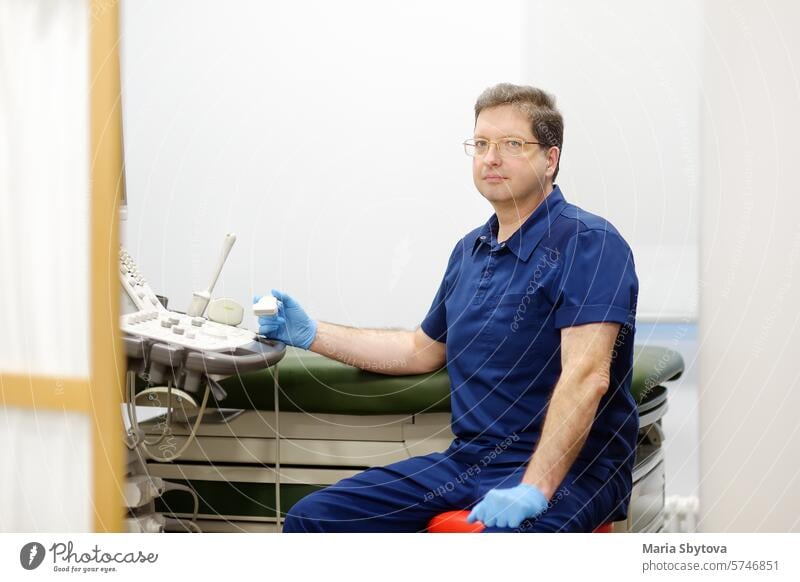 Portrait of oncologist mammologist doctor during appointment of patient. Doctor of ultrasound scanning during working in modern clinic. portrait checkup