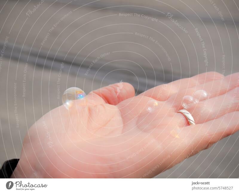 karlsruhelos .... and the magical soap bubbles on the left hand Soap bubble Palm of the hand Parts of body Easy Smooth Simple Authentic Glittering Transience