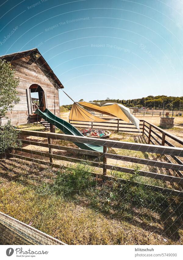 Playground on a ranch Ranch Spain Catalonia Landscape Nature Summer Outdoors Tourism Europe Playing Dry aridity Slide vacation llfranc Costa Brava