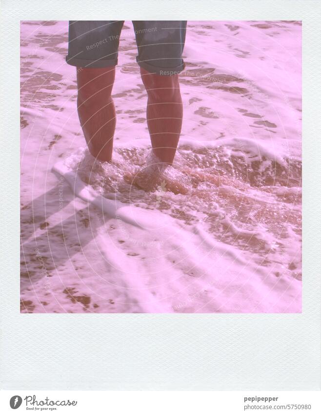 On the beach _ Legs in the water Shadow Man Music Listen to music Headphones Listening portrait Lifestyle To enjoy Joy Adults Technology