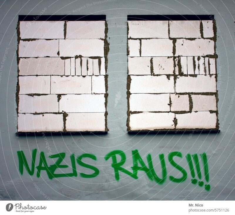 closed I clear edge Window bricked up bricked-up windows Society protest Facade lettering nazis out Argument Rebellious Aggression Protest Politics and state