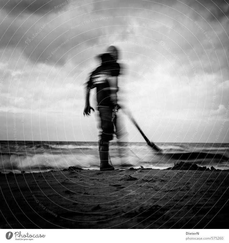 well digger Beach Ocean Human being Child 1 Landscape Sand Water Sky Clouds Horizon Spring Baltic Sea Cap Joy Black & white photo Exterior shot Experimental