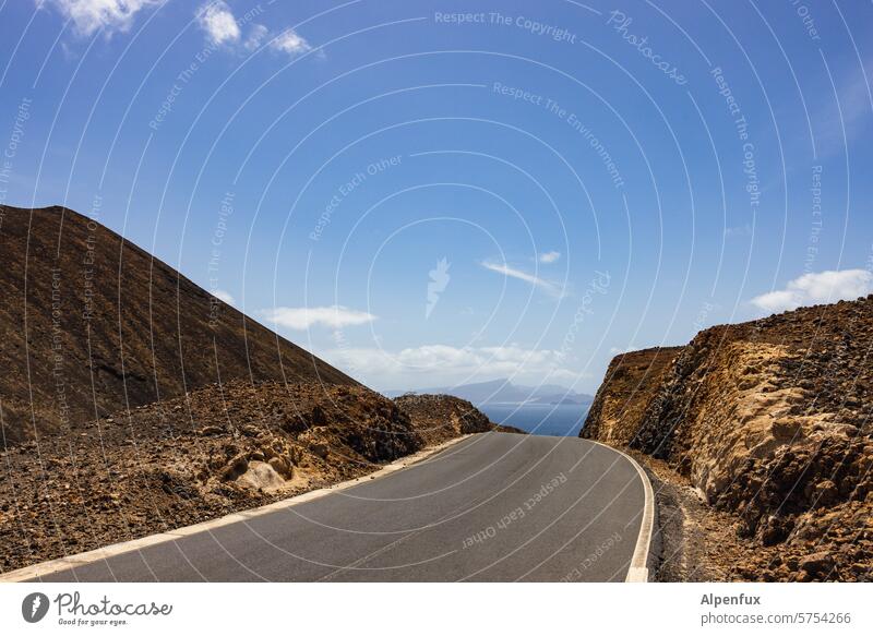 Roads of Cabo Verde II Street outlook Vacation & Travel Mountain Pavement Ocean Landscape Sky Island Atlantic Ocean Exterior shot Colour photo Clouds Nature