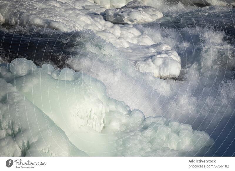 Frozen river details in Icelandic winter landscape iceland nature cold frozen water rapid flow close-up frost chill environmental natural beauty harsh texture