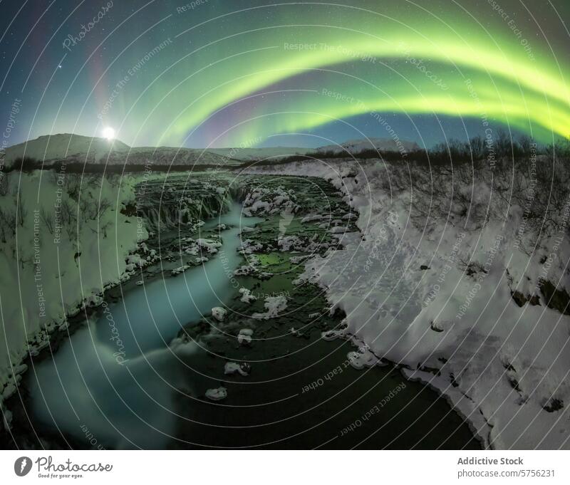 Northern lights illuminating Iceland's winter landscape aurora northern lights iceland snow river night sky natural phenomenon scenic light display vibrant