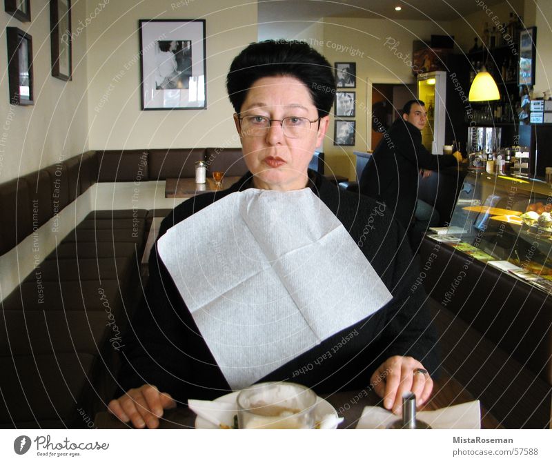 Madame spills ... 50 plus Woman Sidewalk café Bar Breakfast Bib Senior citizen Village Morning Eyeglasses Café Piqued Playing Humor Gastronomy Joy served