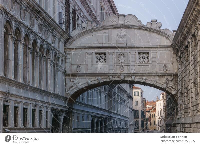 Small canal passing towards famous Bridge of Sighs or Ponte dei Sospiri, Venice, Veneto, Italy bridge venice italy landmark tourism architecture sighs european