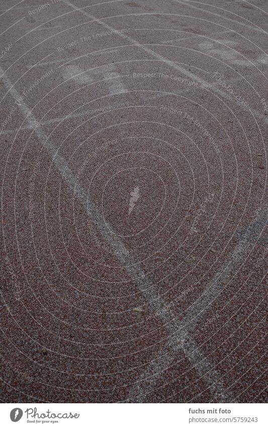 Lines on the sports field. Hoarfrost. Winter on the racecourse Racecourse Hoar frost Sports Track and Field Deserted Sporting Complex Red Day Running track