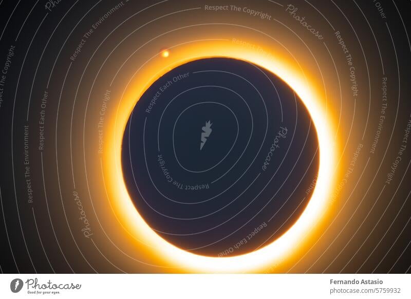 Solar eclipse. Eclipse with ring of fire due to the moon coming between the Earth and the sun. Solar eclipse on April 8, 2024. Solar Eclipse of the Sun on a Cloudy Day. Close-up